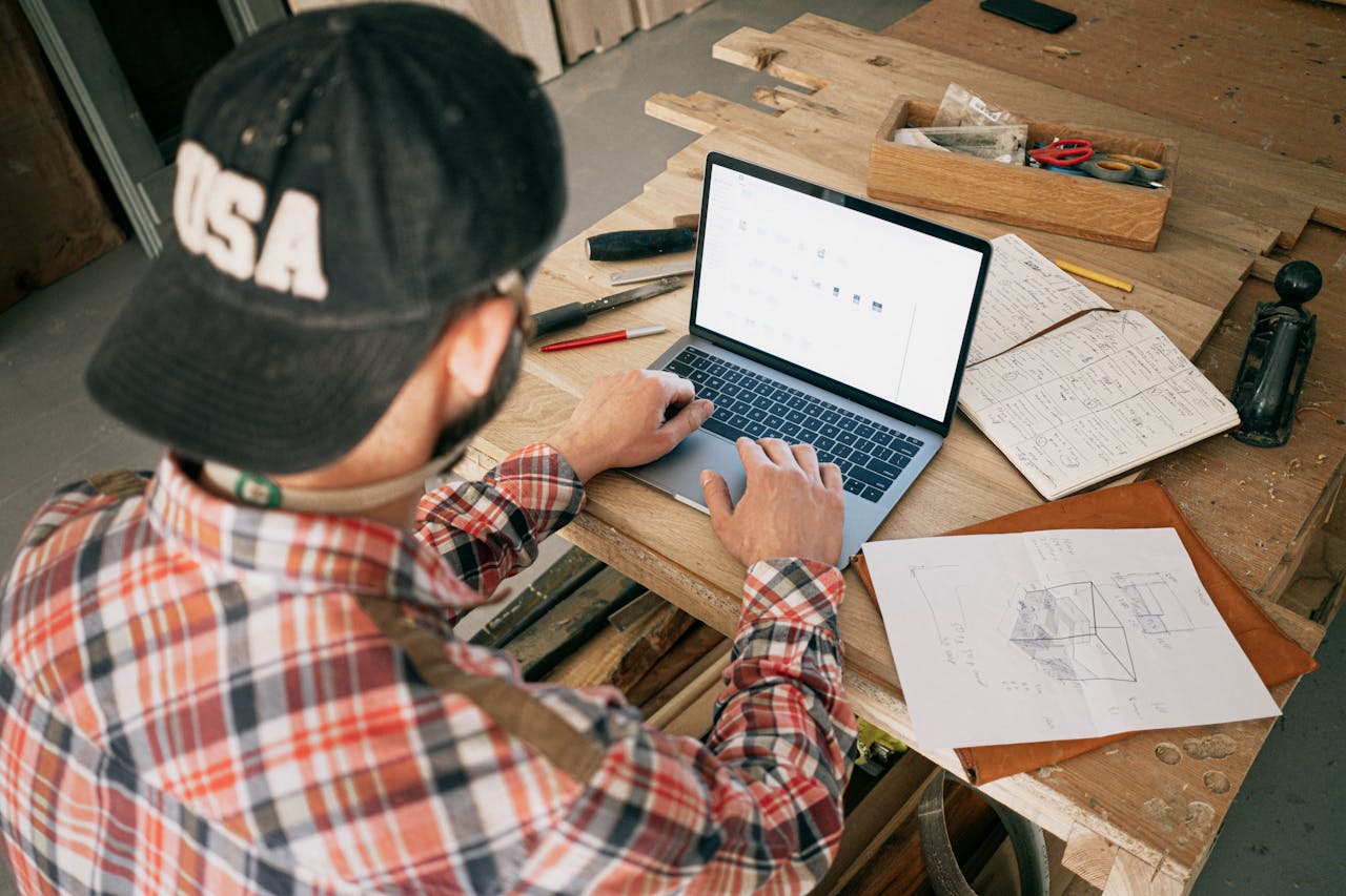 carpenter with laptop