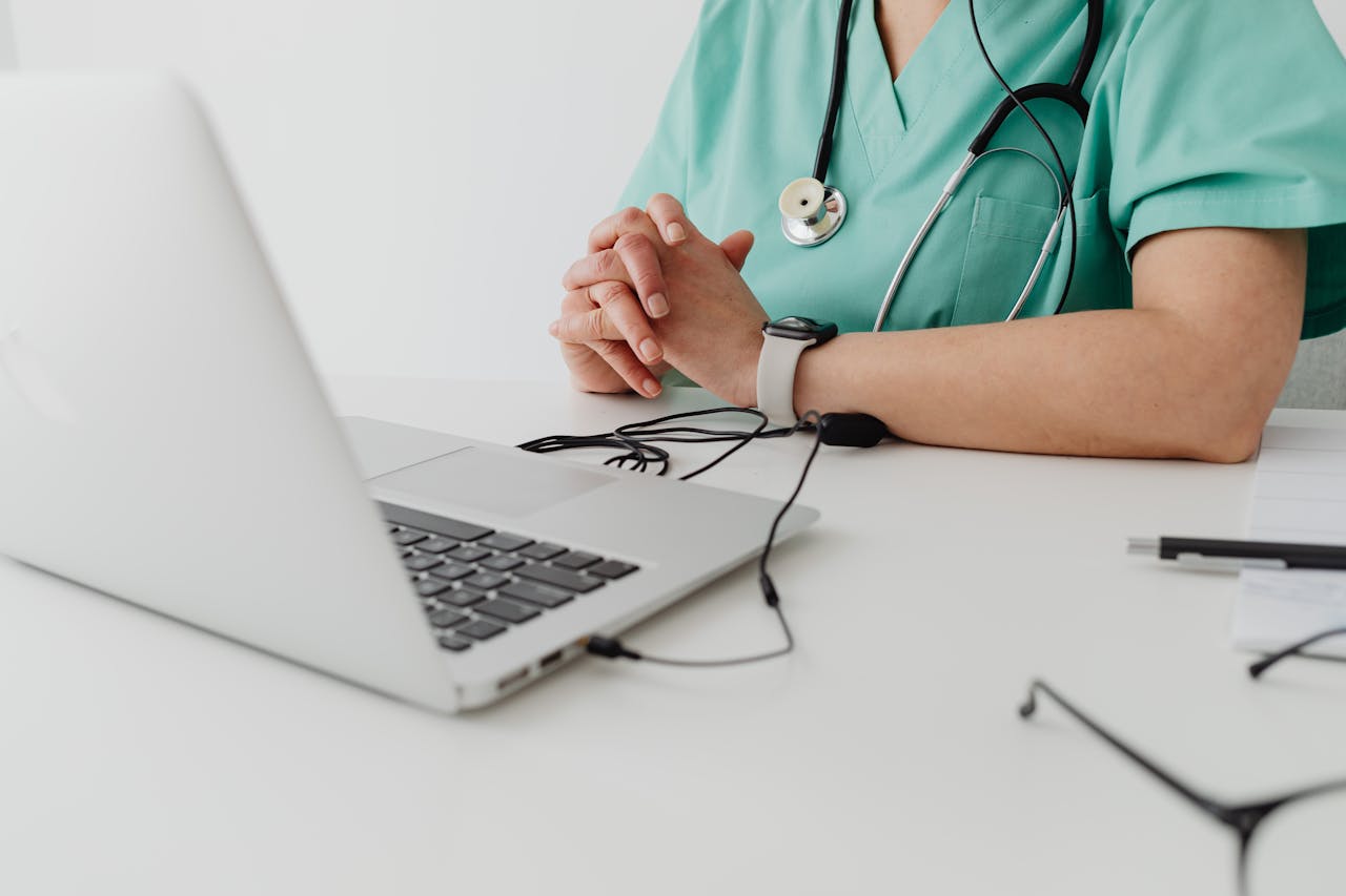 female doctor with a laptop