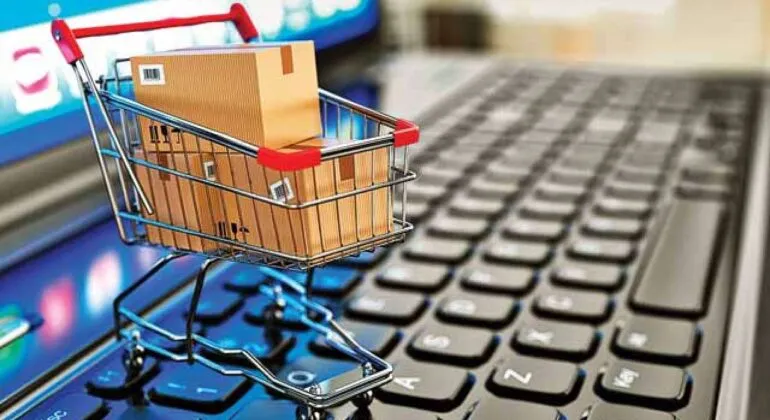 online payments - cart and laptop