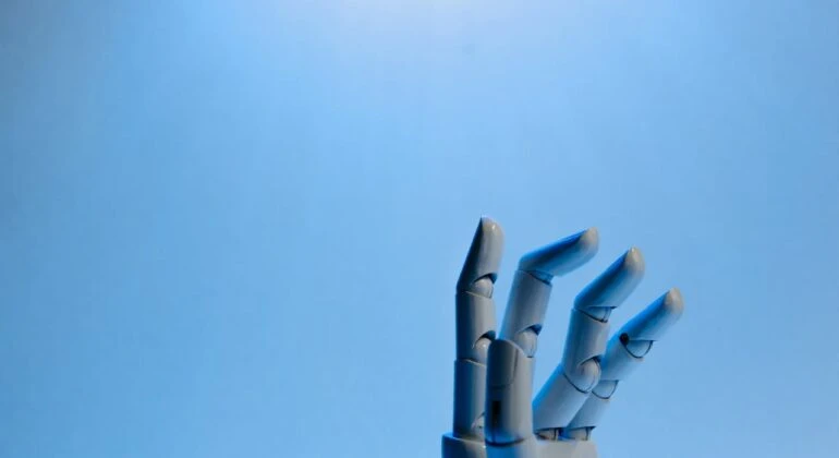 robotic hand on a blue background