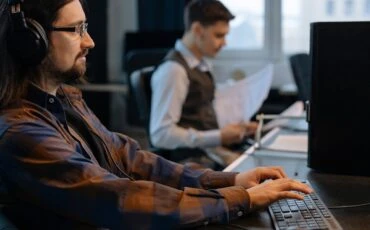 2 developers writing code