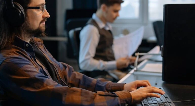 2 developers writing code